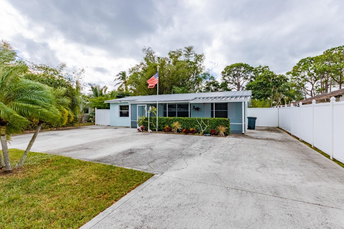 Welcome to this beautifully maintained single-family home offering modern updates, timeless features, and true move-in ready condition -- all with no HOA fees!This property showcases a durable metal roof, known for its longevity and low maintenance, paired with classic terrazzo flooring that brings both charm and easy upkeep to the living spaces. The interior has been tastefully updated, offering a fresh, modern feel while retaining a warm, welcoming character.Whether you're a first-time buyer, downsizing, or looking for a turnkey investment, this home delivers comfort, value, and peace of mind.