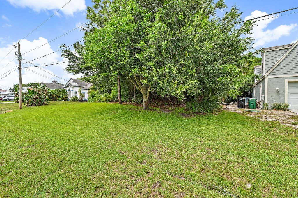 Photo of 4132 SW BELSHAW Street, Port Saint Lucie, FL 34953 (MLS # B26061602)