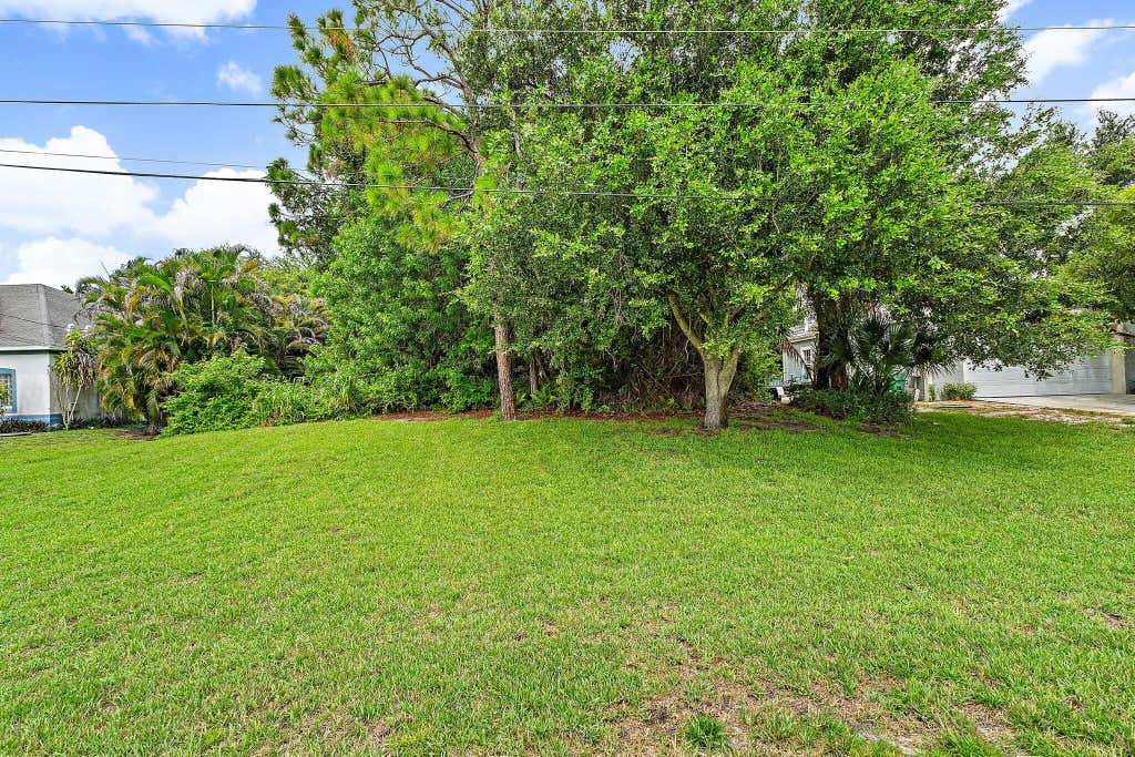 Photo of 4132 SW BELSHAW Street, Port Saint Lucie, FL 34953 (MLS # B26061602)
