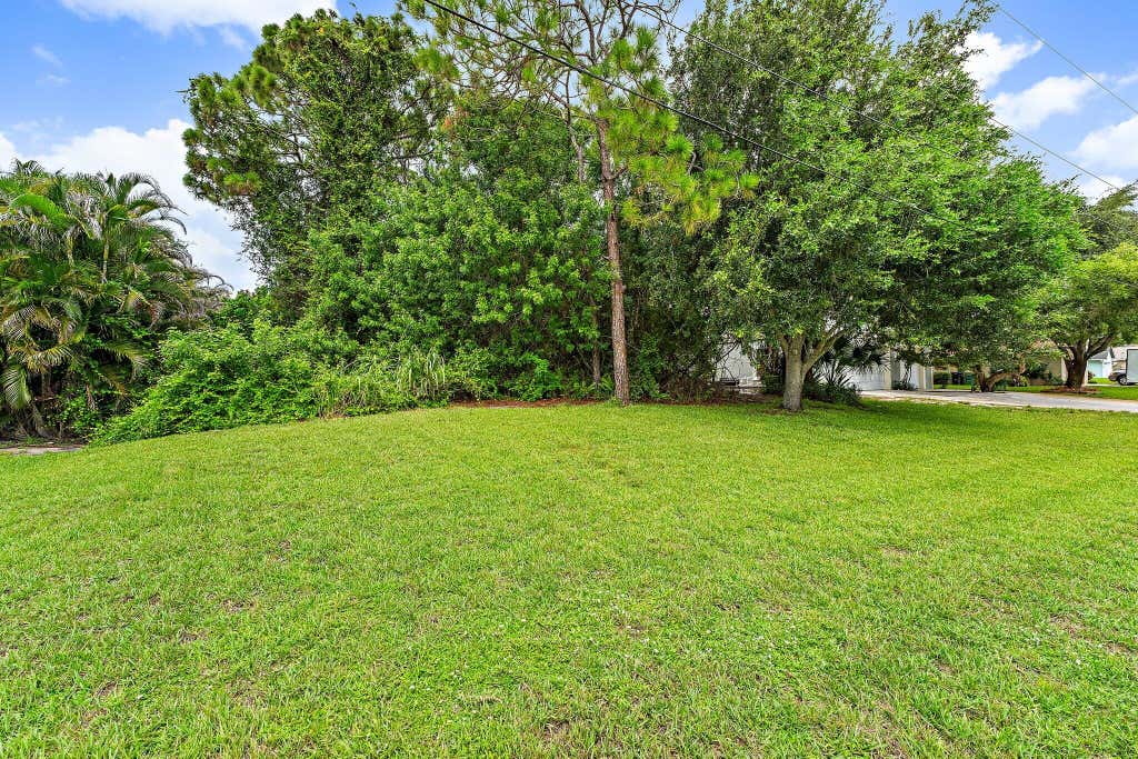 Photo of 4132 SW BELSHAW Street, Port Saint Lucie, FL 34953 (MLS # B26061602)