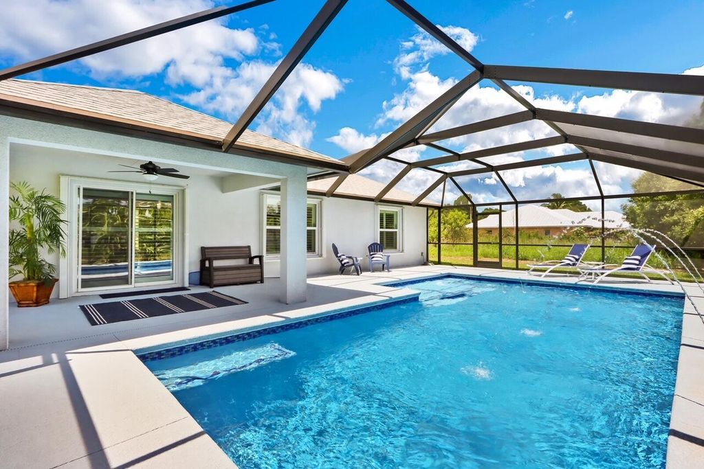 Photo of 2650 SW Dalpina Road, Port Saint Lucie, FL 34953 (MLS # R10930479)