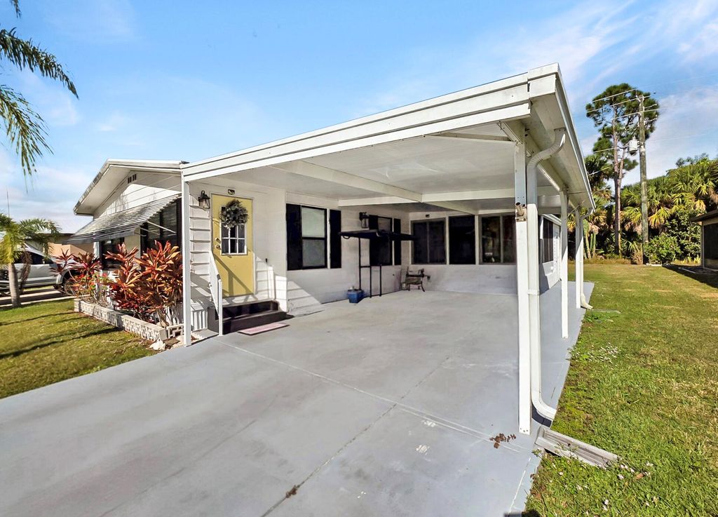 Photo of 35 Flores Del Norte, Fort Pierce, FL 34951 (MLS # R11147757)