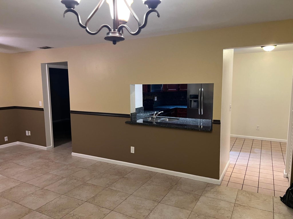 Photo of 11339 Royal Palm Boulevard, Coral Springs, FL 33065 (MLS # B26058245)