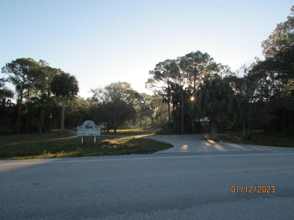 Photo of 8019 SW Citrus Boulevard, Palm City, FL 34990 (MLS # R10893801)