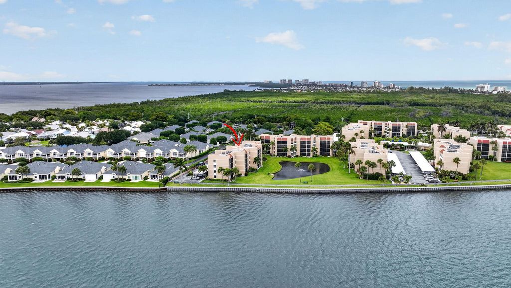 Photo of 3382 NE Causeway Boulevard #7-403, Jensen Beach, FL 34957 (MLS # B26015617)