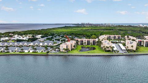 Photo of 3382 NE Causeway Boulevard #7-403, Jensen Beach, FL 34957 (MLS # B26015617)