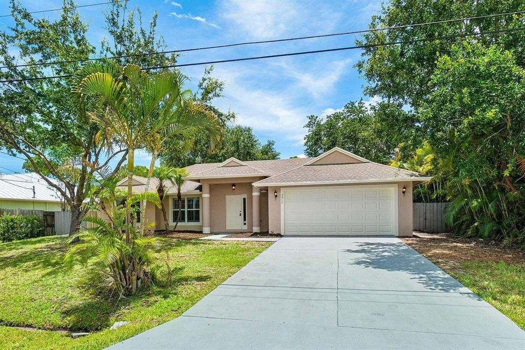 Photo of 2917 SW Prince Road, Port Saint Lucie, FL 34953 (MLS # R10722625)