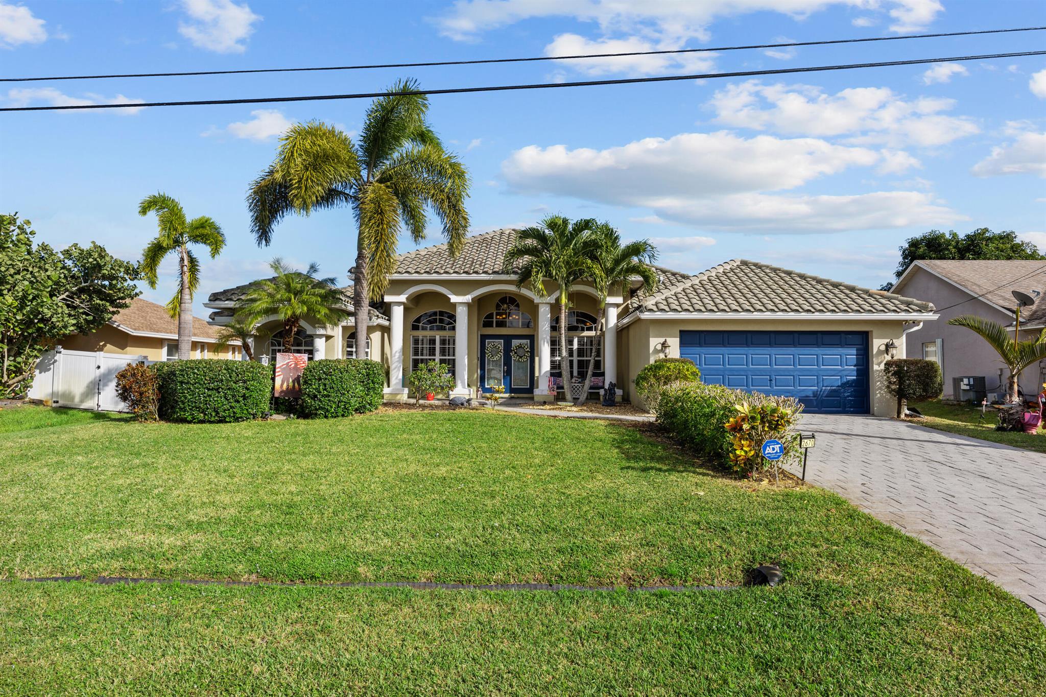 Welcome to 2670 SW Cadet Circle -- a beautifully maintained single-family home that blends Florida charm with everyday functionality. Inside, you'll find a bright, open layout that makes the space feel warm and inviting. Out back, a pool, tiki bar, and covered outdoor area set the stage for effortless outdoor living (yes, you can finally stop telling people you wish you lived in the tropics -- because you basically do). Situated on a generous lot, this home offers plenty of space, comfort, and convenience, all while being close to shopping, dining, and major roadways.