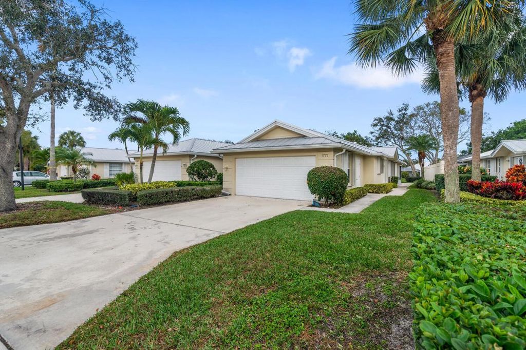 Photo of 1771 SW Waterfall Boulevard, Palm City, FL 34990 (MLS # R10949899)