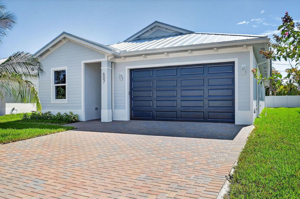 Photo of 607 N Loxahatchee Drive, Jupiter, FL 33458 (MLS # R11136933)