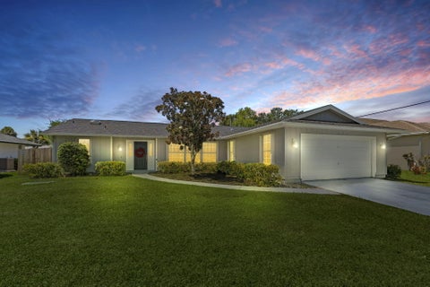 Photo of 1202 SE Mcfarlane AVE, Port Saint Lucie, FL 34952 (MLS # B26054214)