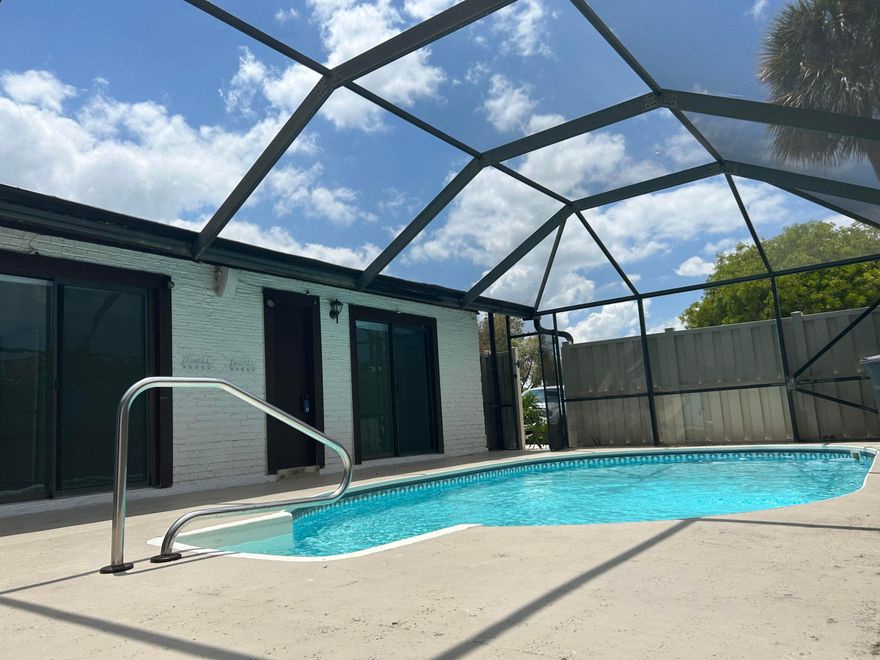 Beautifully updated and move-in ready, this rare private pool home offers the perfect blend of comfort, style, and low-maintenance living in one of Boca Gardens' most desirable locations. Privacy, privacy, privacy—this home features a secluded screened-in private pool retreat, creating your own peaceful backyard oasis perfect for relaxing, entertaining, and enjoying Florida living year-round.    Inside, the bright open layout showcases a renovated white kitchen with granite countertops, stainless steel appliances, custom backsplash, and abundant cabinetry. The spacious primary suite offers a large vanity area, generous storage, and plenty of natural light, while the additional bath and indoor laundry provide both function and everyday convenience. The HOA adds exceptional value by covering the roof, cable, and exterior maintenance, making ownership simple and stress-free. Residents enjoy resort-style amenities including three community pools, fitness center, tennis and basketball courts, playgrounds, and beautifully maintained grounds.    Located in an area with top-rated schools and close to shopping, dining, and major conveniences, this is a rare opportunity to own a private pool home in Boca Gardens. Homes with this much privacy and a private pool do not come along often! Living in Boca Gardens means resort-style amenities right at your fingertips: 3 community pools, tennis and pickleball courts, a clubhouse, playgrounds, and walking paths. All this with low HOA fees that include cable,, roof maintenance and REPLACEMENT, and exterior care. Conveniently located near A-rated schools, shopping, restaurants, and major highways, this home offers both comfort and lifestyle. Don't miss this opportunity to own one of the most desirable models in Boca Raton's Boca Gardens!