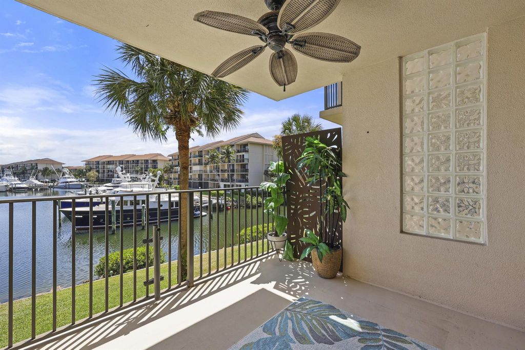 Photo of 1601 Marina Isle Way #202, Jupiter, FL 33477 (MLS # R10981801)