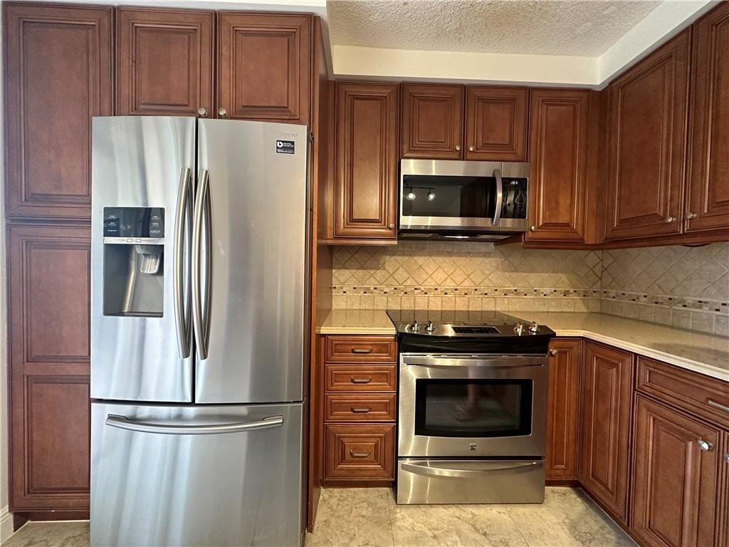 Rarely available townhouse, 3 Bed 2.5 Bath, freshly painted patio, renovated master bath, walking distance to
clubhouse and pool area. Nestled between Palmetto Park Rd & SW 18th St in Boca Raton, this spacious
townhouse is the perfect location...close to everything, yet peaceful & quiet. Great school district! The
downstairs bedroom & half bath are perfect for guests or a study/office. Bright, light & neutral colors throughout,
master bedroom upstairs overlooking a shared, open balcony w/ the 3rd bedroom, his & her closets w/ mirrored
doors, master bath has a separate shower & tub (recently renovated). Huge, private, fenced patio perfect for
entertaining and weekend BBQ’s. Each room features sliding doors w/ accordion shutters. Pool, tennis court and
playground for the kids.