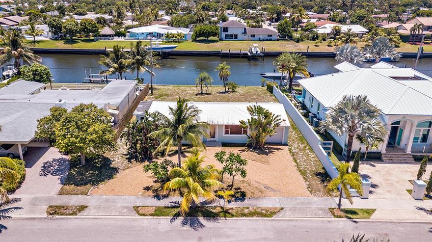 Perfect opportunity to build your waterfront home in the highly desired SOSO neighborhood. This property boasts 75 feet of water frontage and is situated on the C-51 canal with direct ocean access and no fixed bridges. Zoned for South Olive Elementary school, close to Flagler Drive and its bike trail, area beaches, local restaurants and I-95.