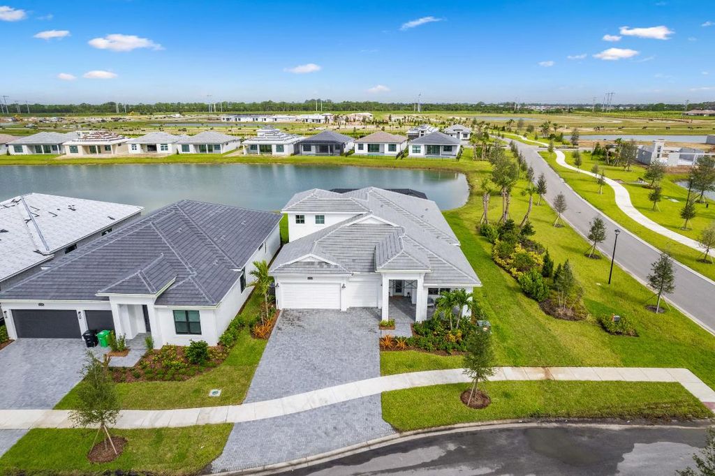 Photo of 8430 SW Cantante Way, Port Saint Lucie, FL 34987 (MLS # R11052460)