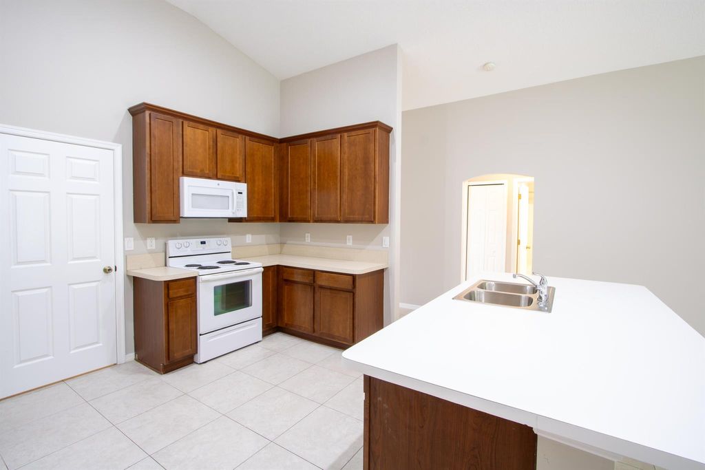 Photo of 1442 SW Medina Avenue, Port Saint Lucie, FL 34953 (MLS # R11020440)