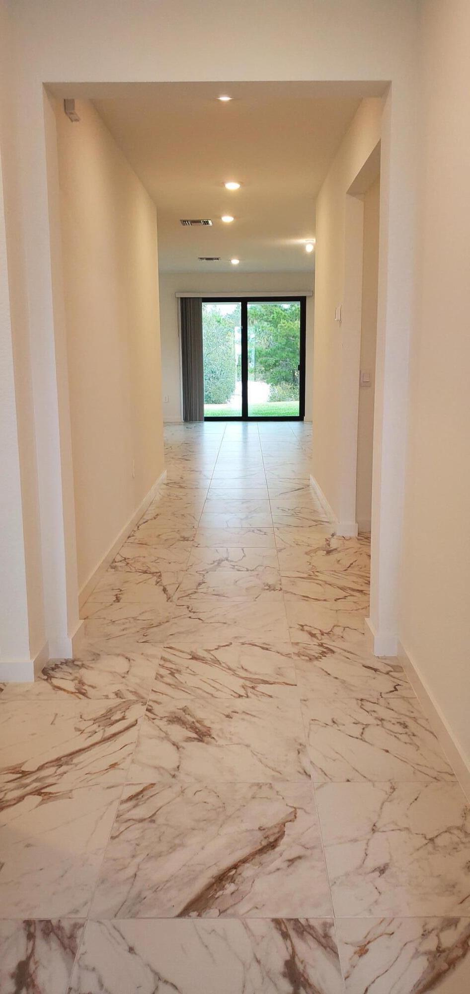 Photo of 1949 NE Ocean Dunes Drive, Jensen Beach, FL 34957 (MLS # B26036156)