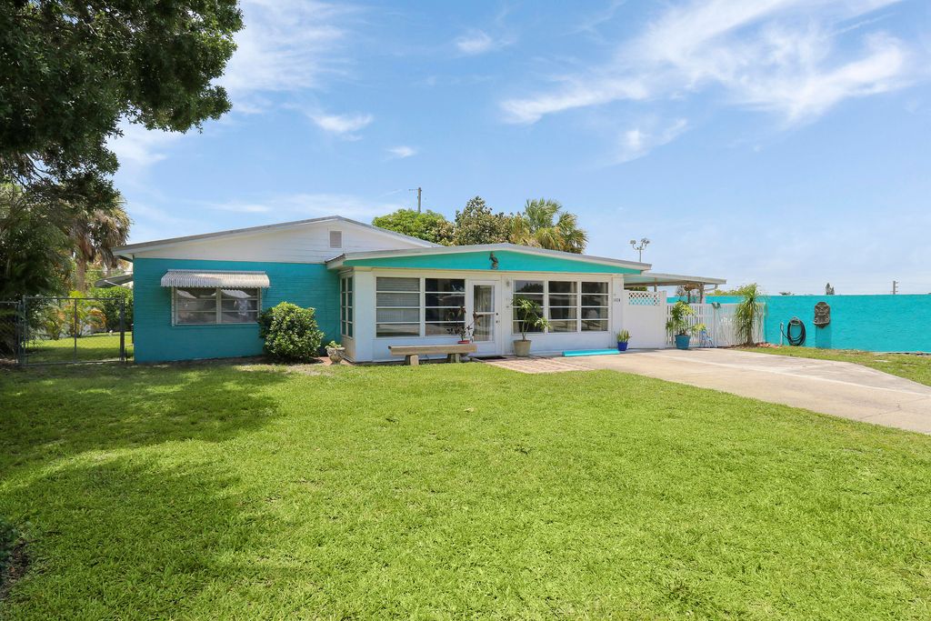 Photo of 1624 NE Orion Street, Jensen Beach, FL 34957 (MLS # R10998115)