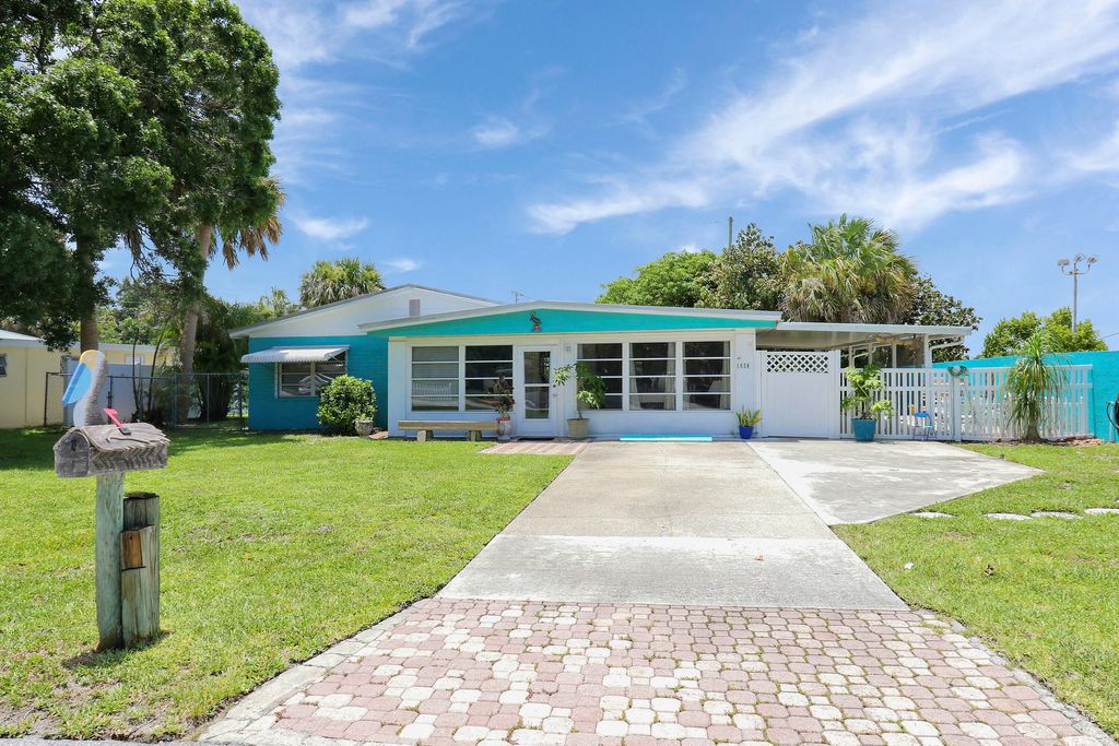 Photo of 1624 NE Orion Street, Jensen Beach, FL 34957 (MLS # R10998115)