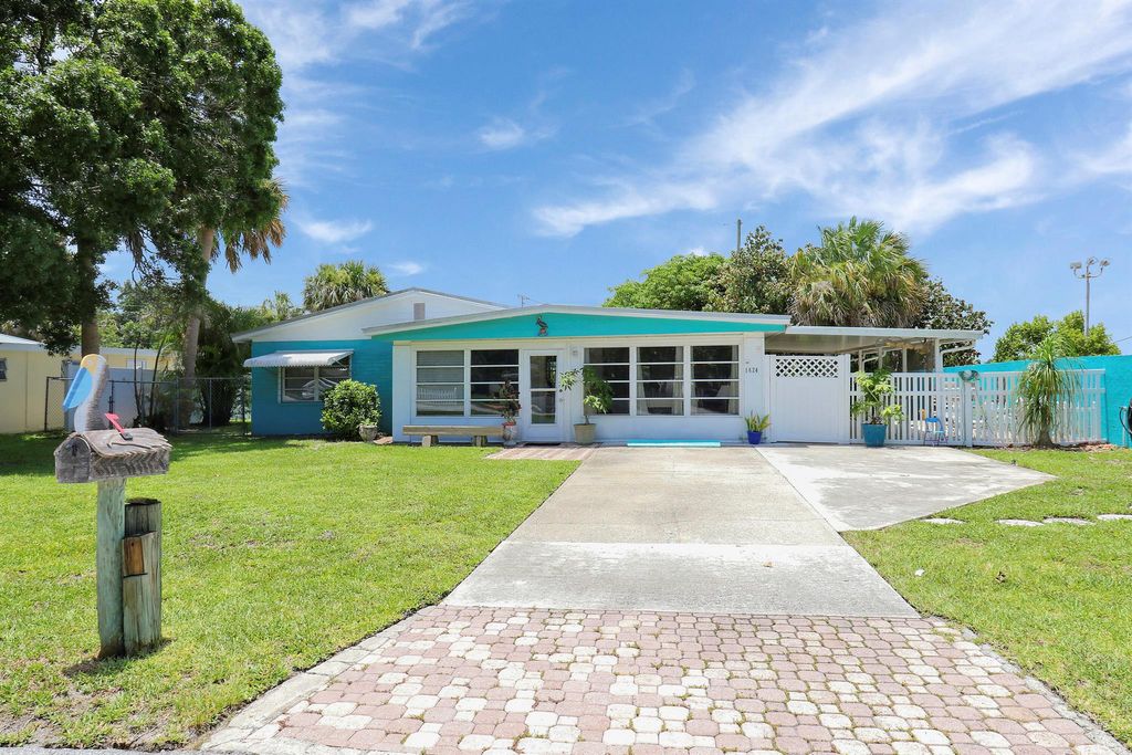 Photo of 1624 NE Orion Street, Jensen Beach, FL 34957 (MLS # R10998115)