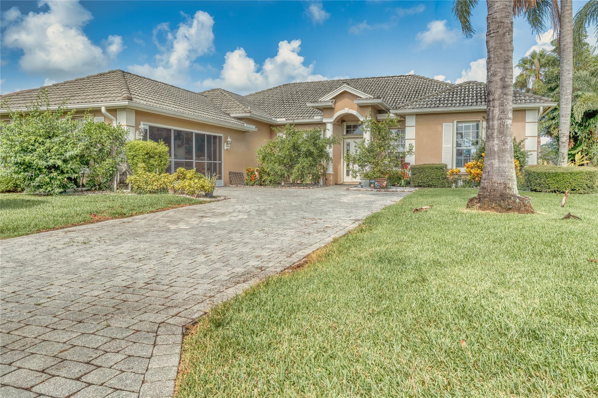 This spacious 4-bedroom, 3-bathroom home offers 2,382 square feet of comfortable living space and a lifestyle of relaxation and convenience. Situated on a beautifully landscaped lot with stunning golf course views, this property blends indoor comfort with outdoor beauty. Inside, you’ll find a bright, open layout with modern upgrades throughout, including newer appliances, a newer A/C system, and a newer roof. The home also features a premium water filtration system and a newer interior hot tub—perfect for unwinding in style. With generously sized bedrooms, a well-appointed kitchen, and peaceful surroundings, this home is ideal for both entertaining and everyday living. Don't miss the chance to enjoy luxury, space, and views all in one incredible property!