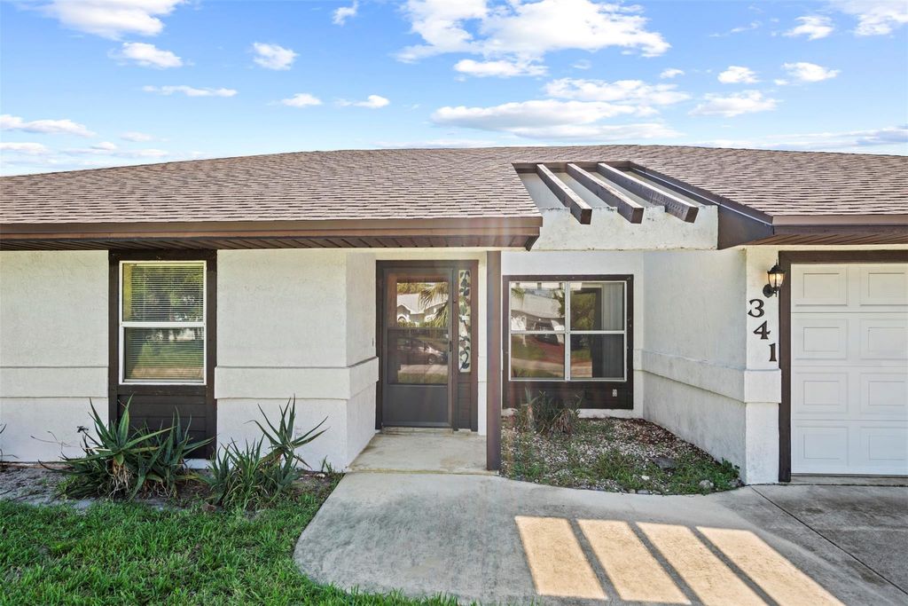 Photo of 341 NW Curry Street, Port Saint Lucie, FL 34983 (MLS # F10518427)