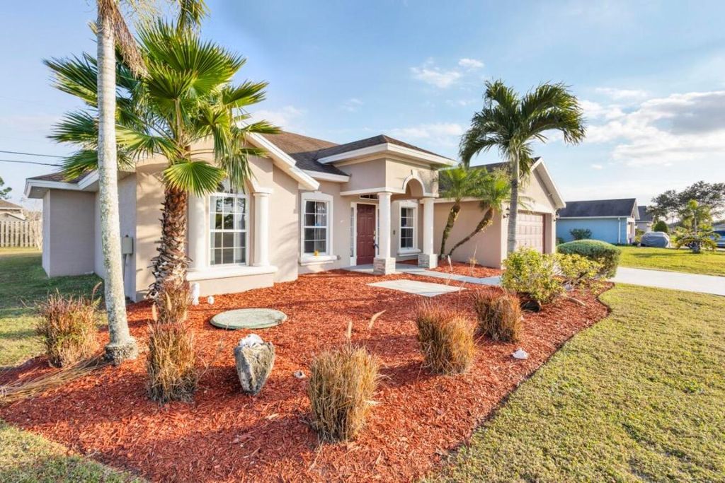 Photo of 1891 SW Lewis Street, Port Saint Lucie, FL 34987 (MLS # R11132089)