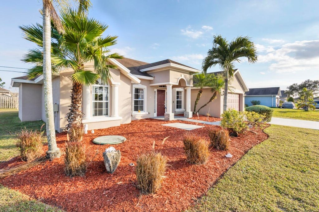 Photo of 1891 SW Lewis Street, Port Saint Lucie, FL 34987 (MLS # R11132089)