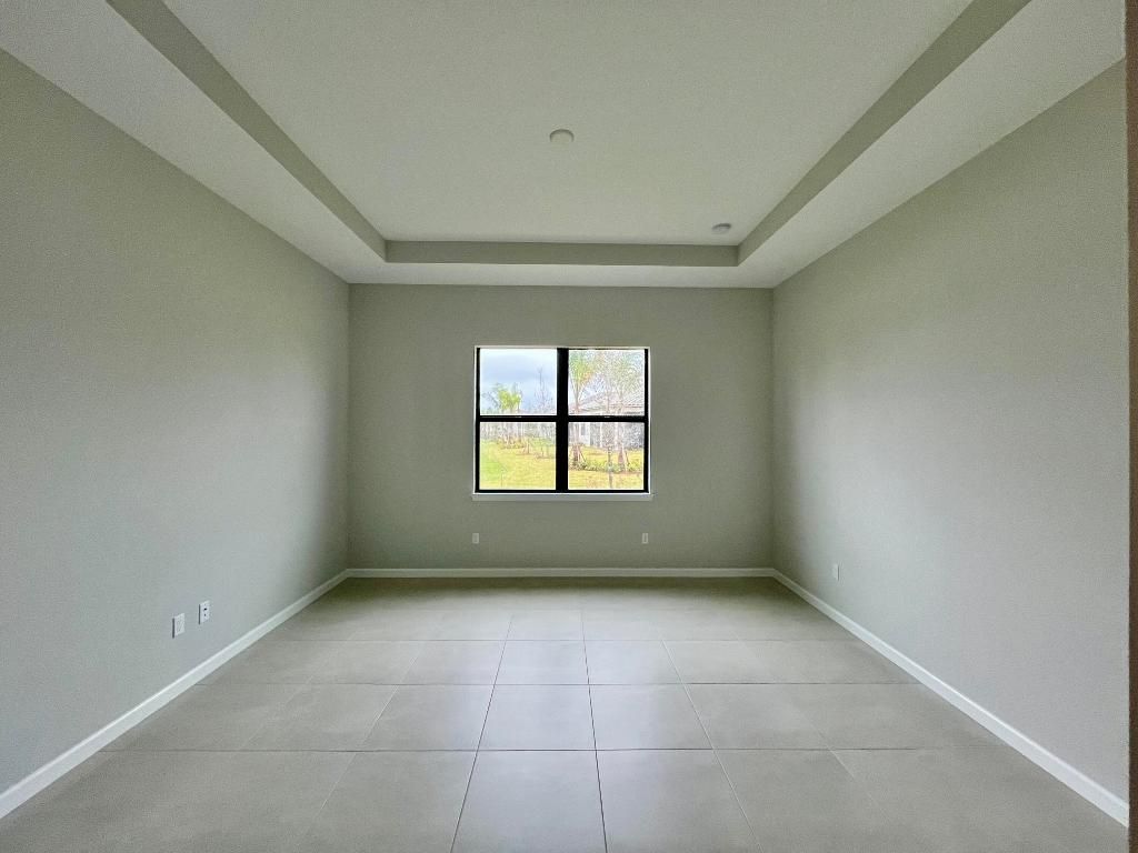 Photo of 809 SE Courances Drive, Port Saint Lucie, FL 34984 (MLS # R10960897)