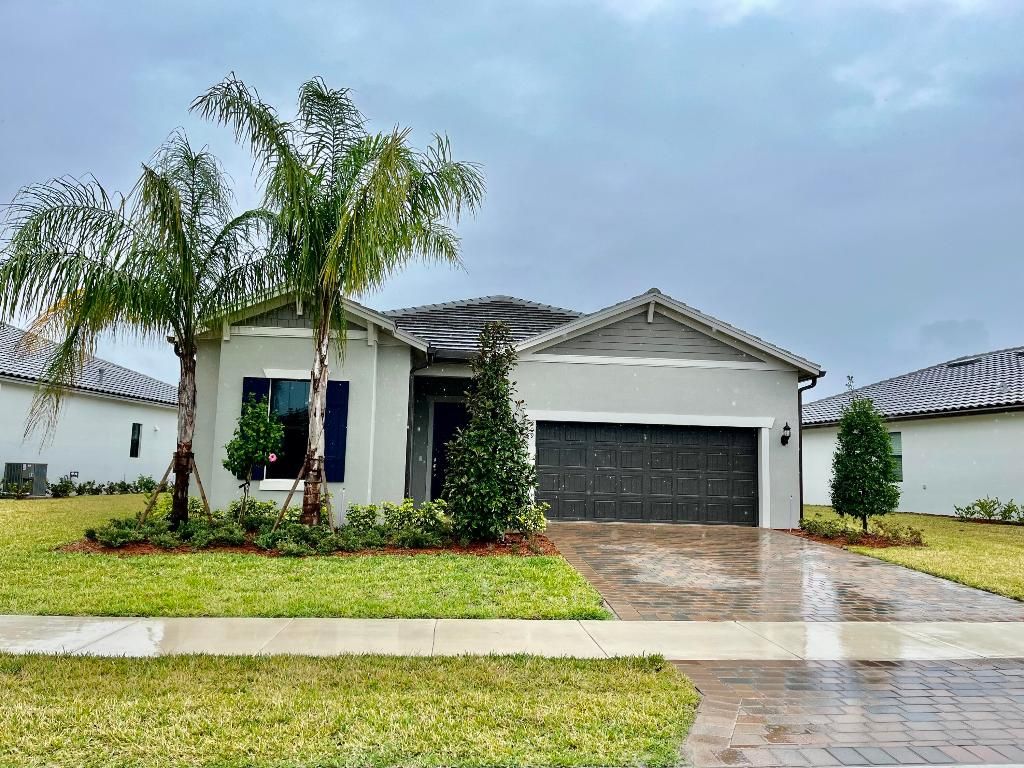 Photo of 809 SE Courances Drive, Port Saint Lucie, FL 34984 (MLS # R10960897)