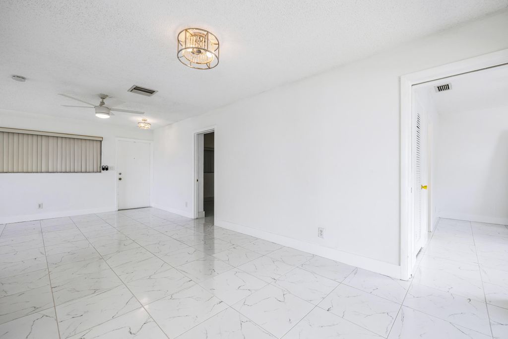 Photo of 941 Crystal Lake Drive #207, Deerfield Beach, FL 33064 (MLS # B26032581)