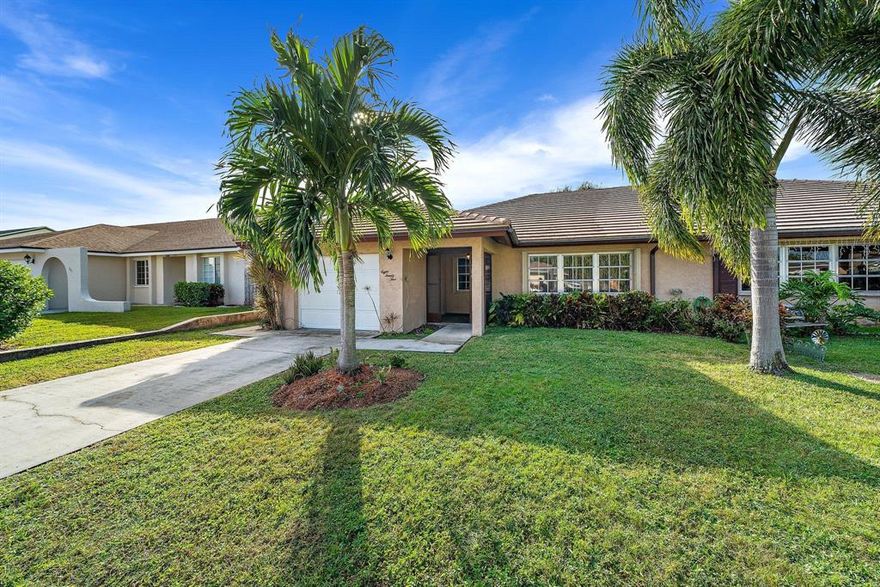 3/2 spacious villa located in the heart of Wellington. A well maintained home waiting for it's new homeowners to move in! The 3rd bedroom can be utilized as a den/office. Screened porch with a generous yard and room for a pool! Large one car garage. Great curb appeal with beautiful landscaping! Brand new electrical box; installed 2019, newer A/C; 2015, accordion  shutters; 2019, and brand new water heater; replaced 2020. Seller had appraisal completed prior to placing on the market. This property is priced to sell! Purchase home as your own or an investment opportunity! NO HOA = NO RESTRICTIONS!