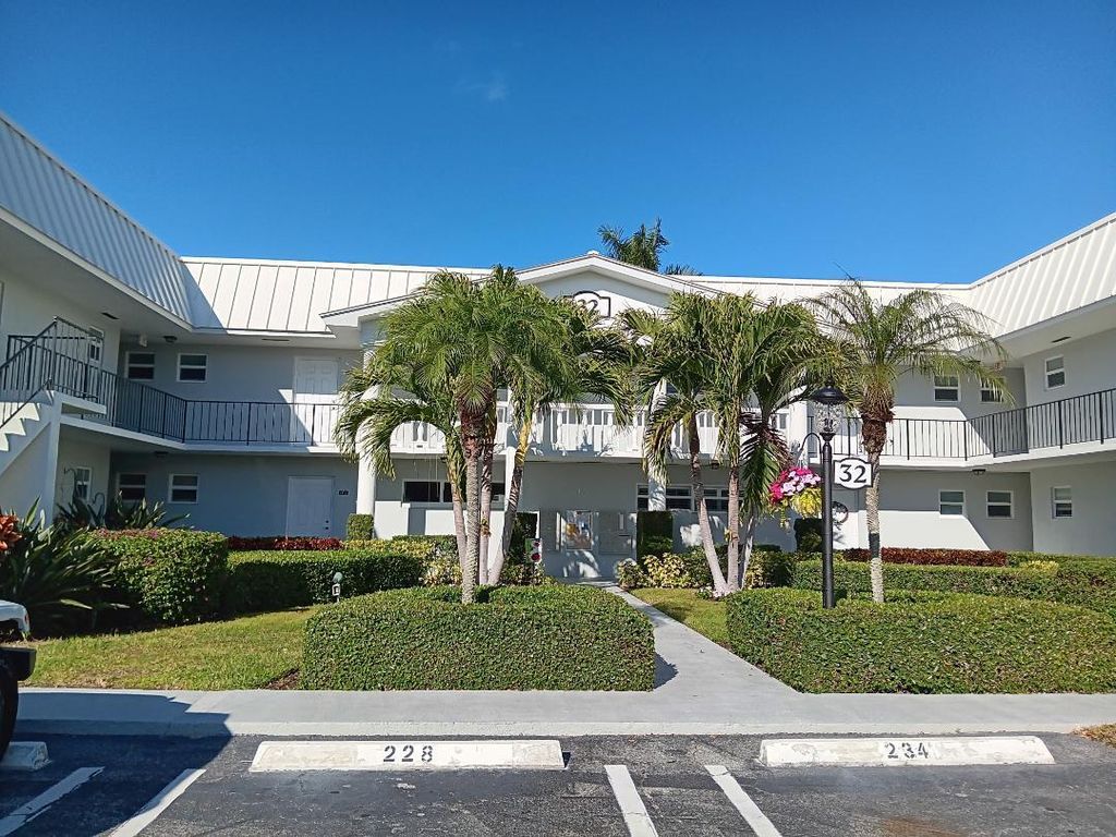 Photo of 32 Colonial Club Drive #201, Boynton Beach, FL 33435 (MLS # R11163750)
