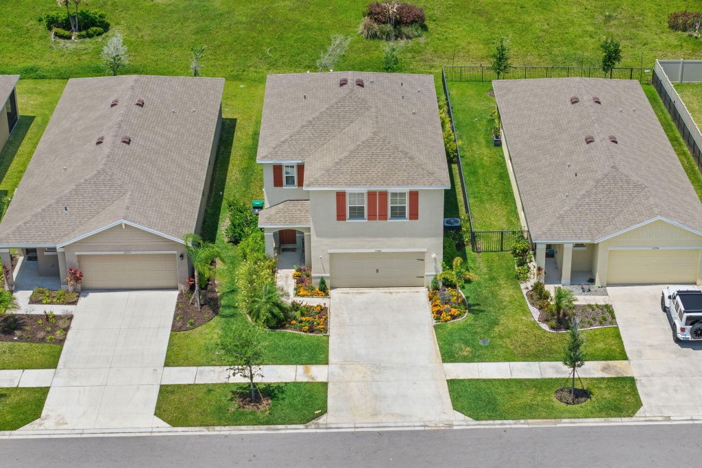 Photo of 10764 SW VASARI Way, Port Saint Lucie, FL 34987 (MLS # B26071903)