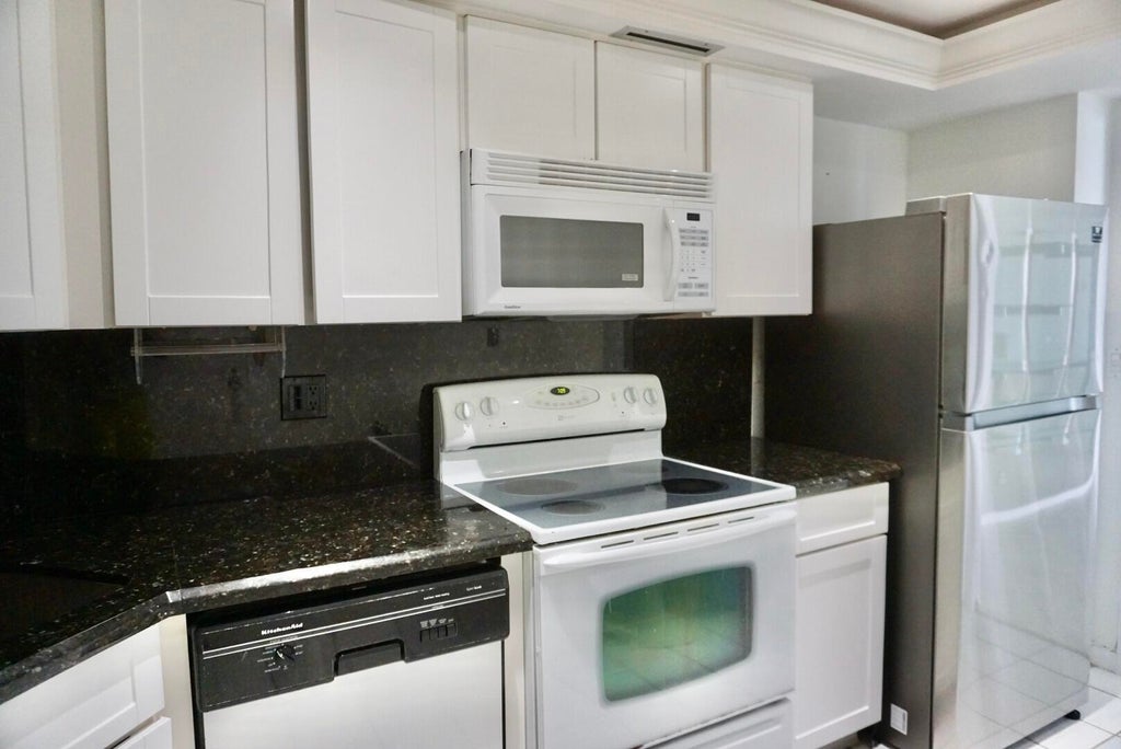 Photo of 2400 Presidential Way #2002, West Palm Beach, FL 33401 (MLS # B26043661)
