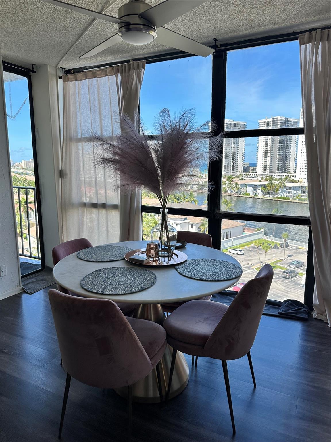 Bright 1BD/1.5BA condo with stunning canal & Miami Beach views. Features open kitchen, floor-to-ceiling windows, spacious balcony, and recent updates. Currently rented, ideal income property. Building completed 40-year recertification and qualifies for mortgage. Amenities: 24/7 attended lobby, heated pool, gym, sauna, tennis, BBQ, billiards, table tennis, bike storage, social activities, and full-time management. Wi-Fi & hot water included. Prime location near beach, Hollywood Boardwalk, Aventura Mall, shopping, casinos, restaurants, Brightline, marinas, golf, and FLL Airport. Association reserves in place.