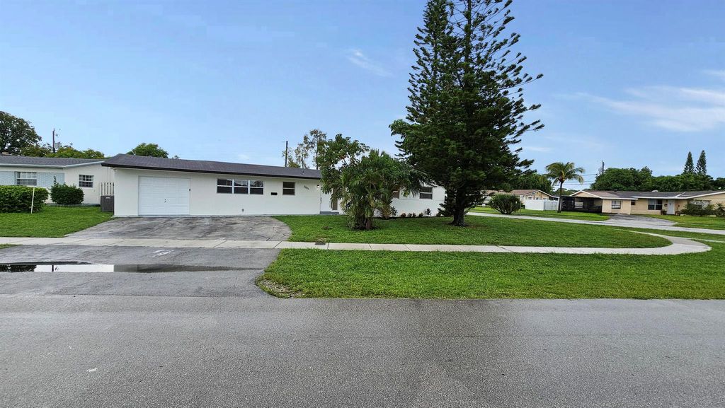 Photo of 3801 NW 6th Street, Lauderhill, FL 33311 (MLS # R11146486)