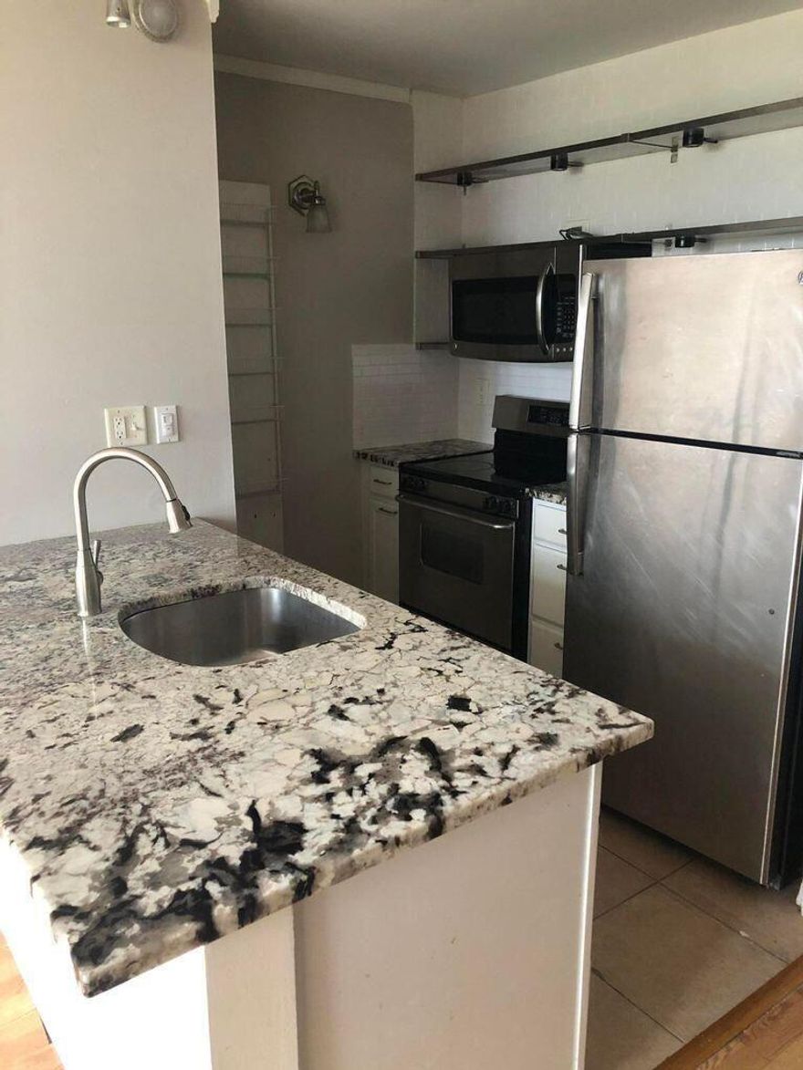 Great one bedroom studio with enclosed room, overlooking the school fields, very private and bright unit.