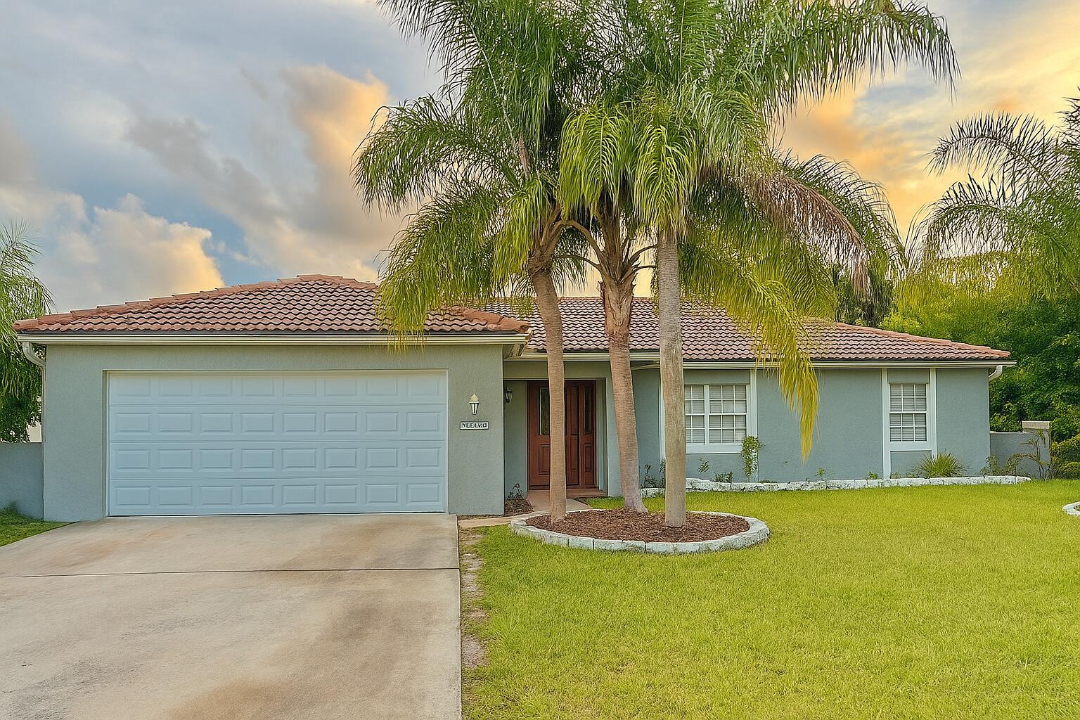 Ideal 3-2-2 house - Must Sell Fast! No carpet! Modern kitchen w/ granite countertops, luxurious primary bath walk-in shower & walk-in closet. Tile roof, 2024 AC & garage door. Covered porch, CANAL lot w/room for backyard living or pool! 2-car garage, prime location near beach & shopping.