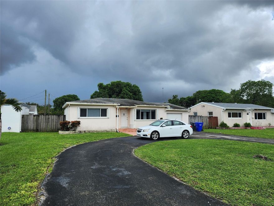 HOLLYWOOD-----NO HOA FEES!!!!---2 BEDROOMS ----1 BATH ----HUGE FENCED  LOT------OPEN PATIO (22X16) -----CIRCULAR DRIVEWAY CAN FIT 8-9 VEHICLES---1 CAR GARAGE (22X11)--WITH AUTOMATIC OPENER & ADDITIONAL STORAGE  SPACE-----LOTS OF POTENTIAL HERE TO MAKE THIS YOUR DREAM HOME ---ZONED RN12 WHICH ALLOWS MULTI FAMILY PER CITY OF HOLLYWOOD---UTILITY ROOM WITH WASHER AND DRYER---------AC 2 YEARS OLD---CEILING FANS----KITCHEN HAS SNACK COUNTER-----FLORIDA ROOM LEADS TO OPEN PATIO TO ENJOY TRANQUIL BACKYARD LIVING---LOCATED MINUTES FROM ALL MAJOR ROADS  I95---595 AND THE TURNPIKE----SCHOOLS----PARKS----SHOPPING----RESTAURANTS-----MALLS-----ENTERTAINMENT VENUES----CASINOS----AIRPORTS  AND THE BEACHES---SHOWN BY APPOINTMENT----ALLOW TIME FOR ANY OFFERS TO BE REVIEWED BY SELLER'S ATTORNEY....THANK YOU