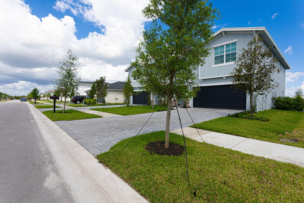 Photo of 1392 Haywagon Trail, Loxahatchee, FL 33470 (MLS # R11007312)