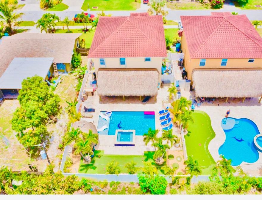 Discover the ultimate South Florida lifestyle in this beautifully updated 4-bedroom, 3-bath home with nearly 2,600 sq ft of living space. Built with quality craftsmanship and enhanced with modern upgrades, this residence offers the perfect balance of comfort, style, and functionality. Inside, enjoy open-concept living areas filled with natural light, an upgraded kitchen with stone countertops, sleek cabinetry, and stainless appliances, plus spacious bedrooms designed for privacy and flexibility. The primary suite is a true retreat, featuring a spa-inspired bath and generous walk-in closet.

The owner has also created additional versatile spaces that can be used as an office, gym, guest area, or whatever suits your lifestyle. Buyer is responsible for verifying all measurements, square footage, and permitting status of improvements.

Step outside to your very own private resort. The backyard is designed for entertaining and relaxation, complete with a sparkling pool, shaded lounging areas, lush tropical landscaping, a custom tiki-style setup, a full outdoor bar area, and even a miniature golf putting green for family fun or guest entertainment. Whether hosting friends, enjoying family time, or unwinding after a long day, this home is built for both everyday living and special occasions.

Best of all, this home sits just minutes from downtown Boynton Beach, where you'll find waterfront dining, shopping, breweries, cultural events, the amphitheater, farmers markets, and the marina district. And when you're ready for the ocean, it's only an 8-minute bike ride, a 30-minute walk, or a quick 5-minute drive to the beach.

Additional highlights include updated flooring, renovated bathrooms, flexible layouts ideal for multigenerational living, and plenty of room for both work and play. And with no HOA, you'll enjoy the freedom to use your property without added restrictions or monthly fees. This property is truly a rare opportunity to own a spacious, resort-inspired home with one-of-a-kind amenities in one of South Florida's fastest-growing areas.
