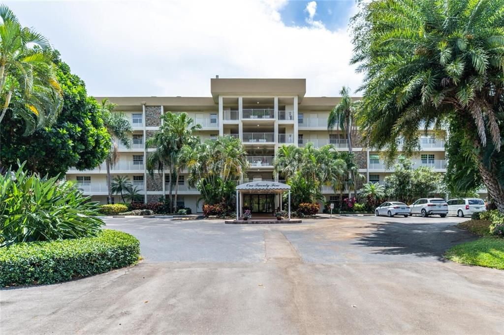 Photo of 4000 Cypress Grove Way #210, Pompano Beach, FL 33069 (MLS # F10326880)
