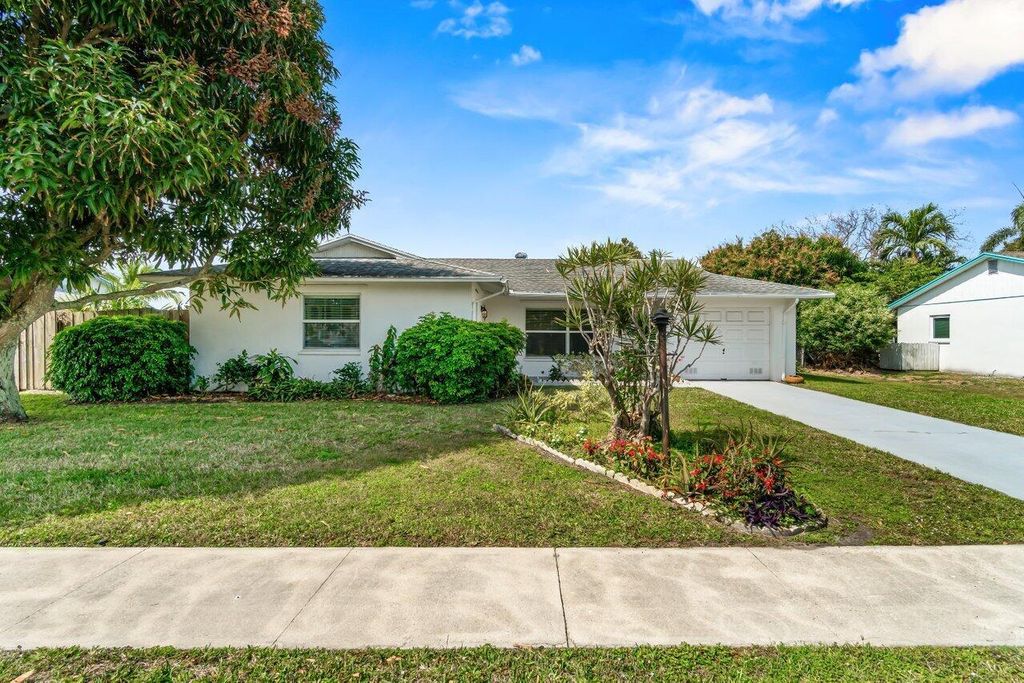 Photo of 1451 E Libby Drive, West Palm Beach, FL 33406 (MLS # R10964716)