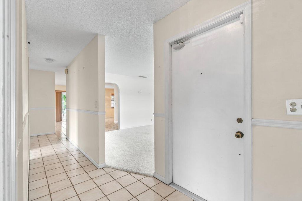 Photo of 1451 E Libby Drive, West Palm Beach, FL 33406 (MLS # R10964716)