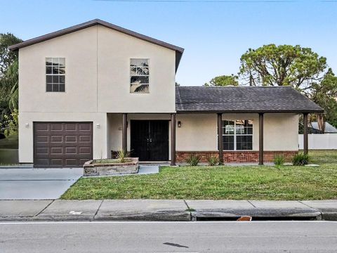 Photo of 565 SE Port St Lucie Boulevard, Port Saint Lucie, FL 34952 (MLS # R11141520)