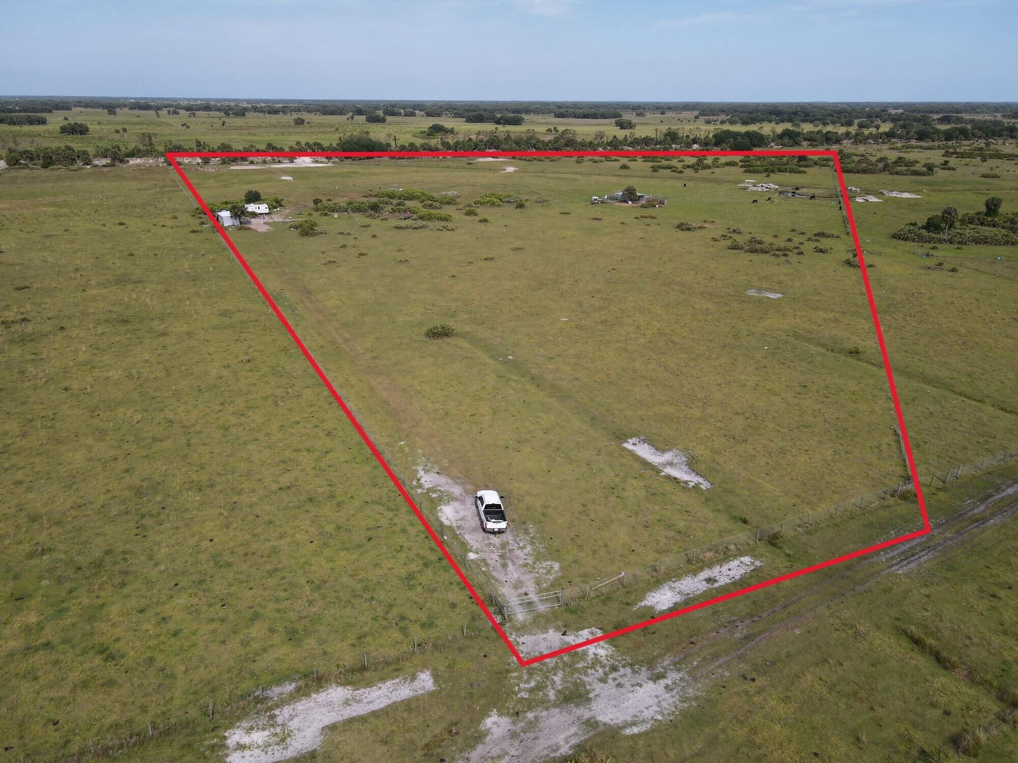 40 acres of improved Agriculural pasture. Currently has livestock on the property. This parcel is fenced with a pond, a set up holding pens, a well and a small camp with a bedroom and bathroom. Owner uses solar and generator to power well. Entire 40 acres is fenced and is dry usable land. Nice rural and private location, great weekend spot or new farm site.