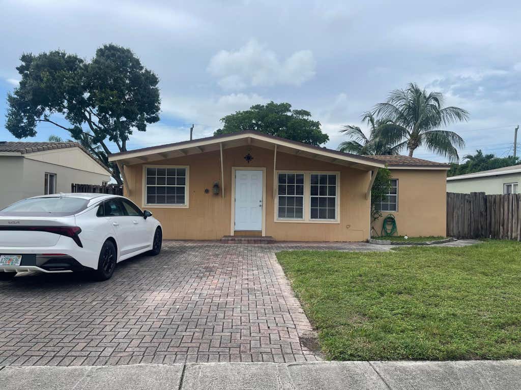Photo of 341 NW 52nd CT, Oakland Park, FL 33309 (MLS # B26046532)