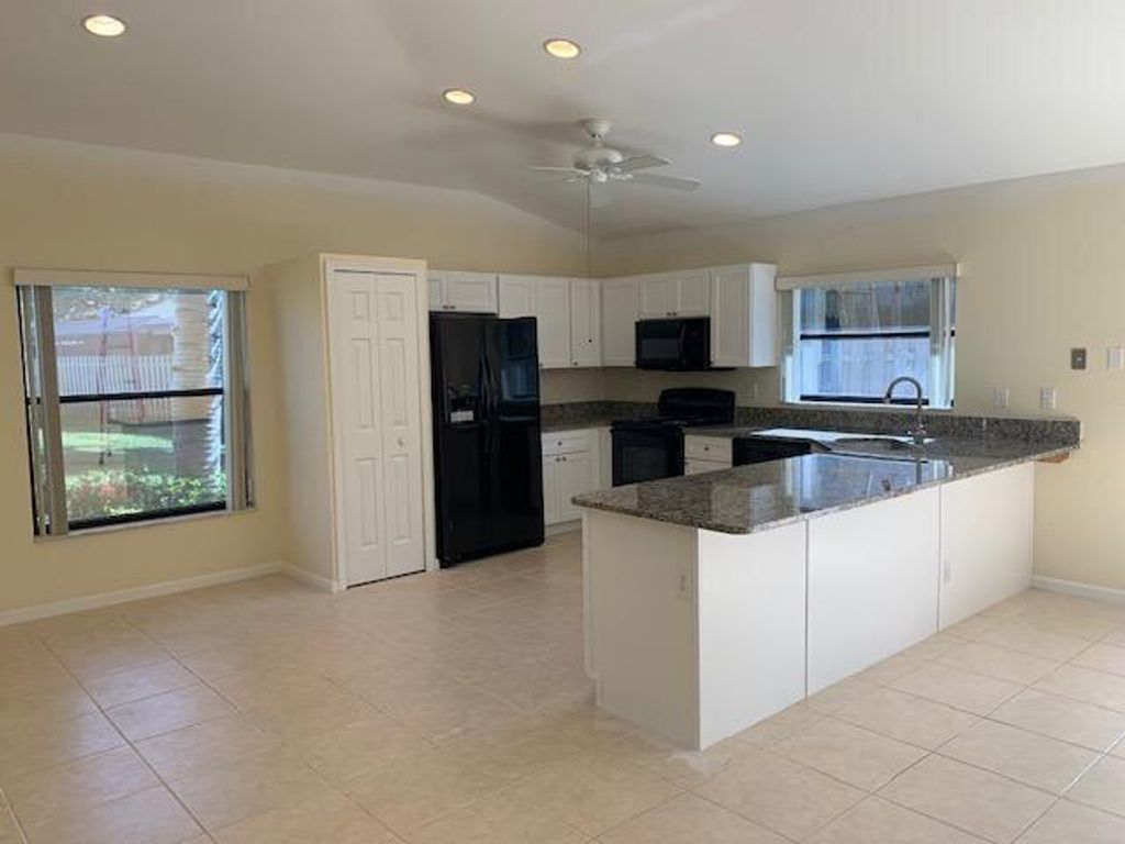 Photo of 11198 Marjoram Drive, Palm Beach Gardens, FL 33418 (MLS # R10958090)
